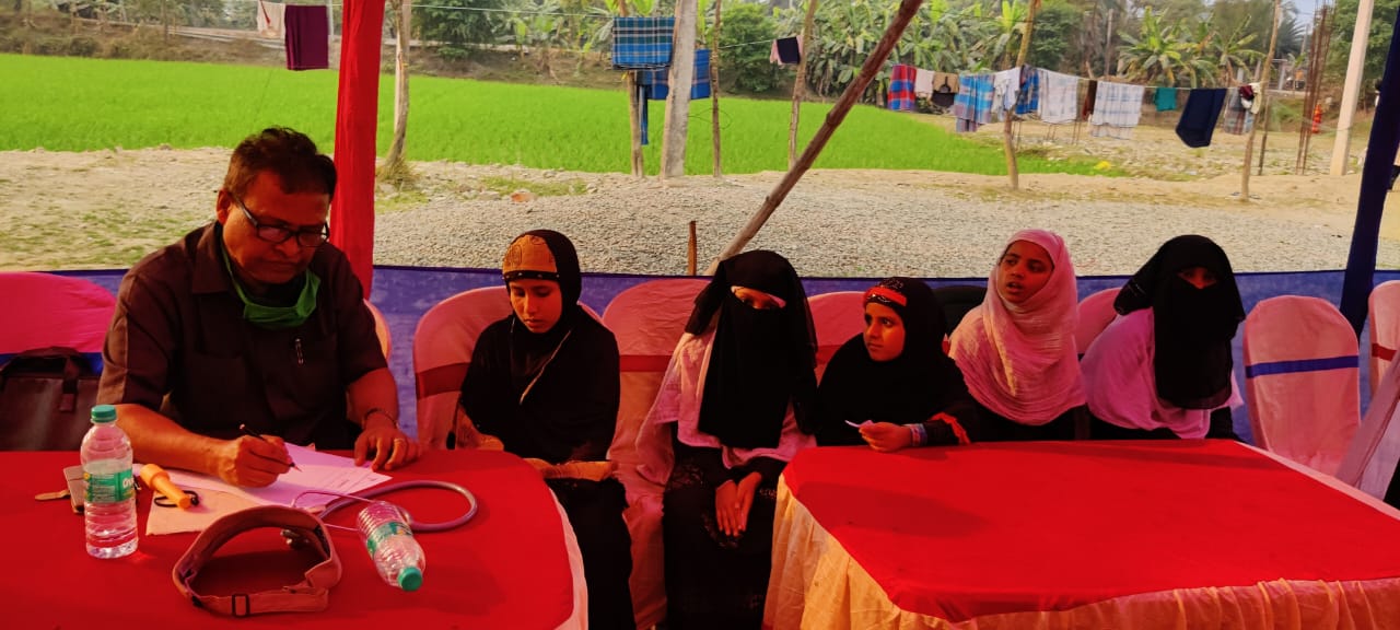 Doctor addressing women participants
