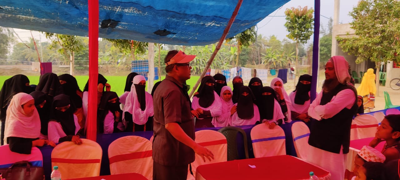 Speaker addressing women community members